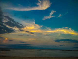 Beach, sands, and ocean against blue sky at Nusa Dua Bali - Indonesia.