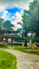 gazebo and pathways at beach against blue sky. Nusa dua, Bali.