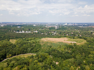 Aerial landscape of Grunewald forest and city skyline on a sunny day in Berlin