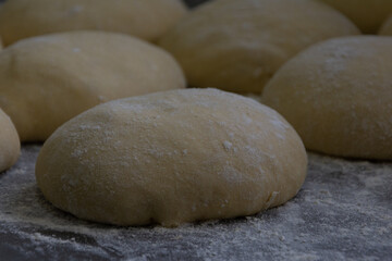 The process of making dough for sweet bread at home. Making buns with flour. The concept of baking bread
