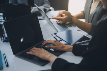 Finance manager meeting discussing company growth project success financial statistics, professional investor working start up project for strategy plan with document, laptop and digital tablet.