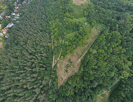 Aerial top down of hiking trails on Drachenberg trash mountain in Grunewald forest in Berlin