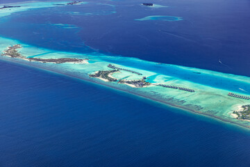 Maldives paradise island. Tropical aerial landscape, seascape with atoll, water bungalows villas...