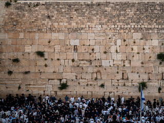 Jewish praying at the wailing wall in Jerusalem