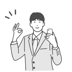 スマホを持ち笑顔でオーケーポーズをするスーツ姿の若い男性のイラスト　モノクロ　白バック、背景なし