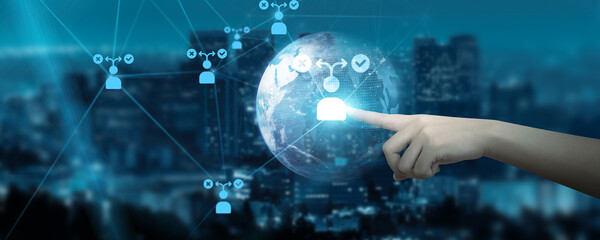 Hand touching global network connection on decision making signifies the nexus of technology and future-forward thinking.