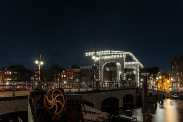 The Magere Brug (Skinny Bridge) in Amsterdam at night completely empty