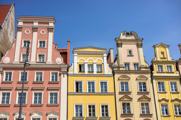 Beautiful colorful facades of antique building at Wroclaw, Poland. Polish landmark in the historic center of town. Clear blue sky