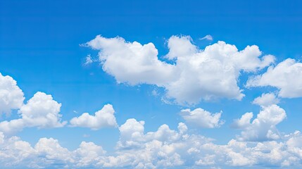 puffy blue sky light clouds