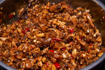 A bowl of traditional Chinese pickled vegetables, black bean chili sauce