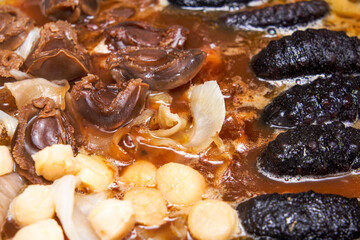 A pot of sumptuous and luxurious Chinese New Year Poon Choi, delicacies from both mountains and seas