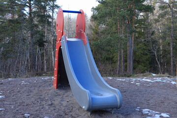 Slide at playground outside in February. Stockholm, Sweden.