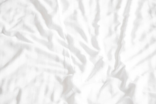 White bedding in the room with copy space.