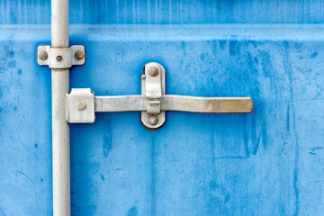 container locking mechanism mounted on a steel blue container