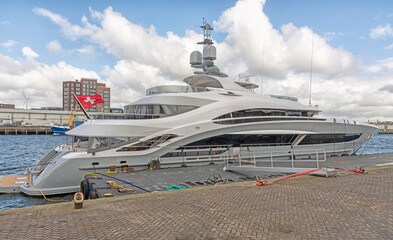 superyacht is moored at the quay of the harbor