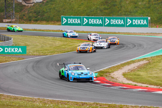 Oschersleben, Germany. 29th April, 2024. Porsche Sixt Carrera Cup Deutschland Scenic view battle fast 992 supercars at Oschersleben Motorsport Arena race track. European motors auto sport competition