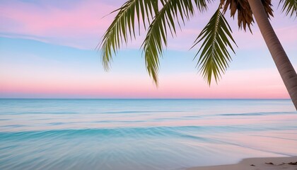 A tropical beach scene with a palm tree frond in the foreground, reflecting in the calm, turquoise waters of the ocean under a pastel pink and blue sky