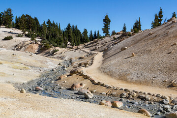 colorful hot water stream into the Bumpass hell at lassen volcanic national park, california
