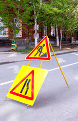 Road works sign at the city street