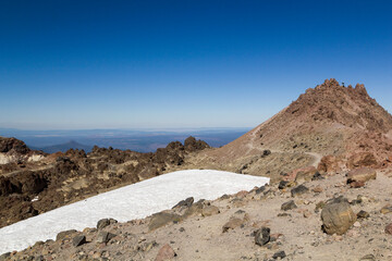 view over a snow area in to the valley of lassen volcanic national park, califronia