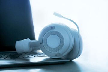 IT service desk or Help desk; Call center support; Headphone on computer laptop