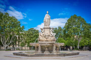 Nîmes, France - 04 17 2024: View of the Pradier White marble fountain .