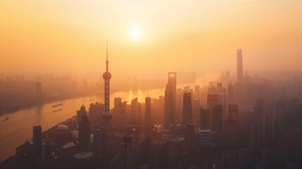 Aerial view of modern city skyline and buildings at sunrise in Shanghai