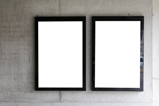 Two empty mock-ups of street advertising billboards; two blank ad placeholders outdoor