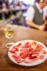 Glass of Fino and Iberian Ham at a Sevilla Tavern