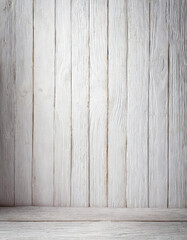 Wall and floor made of wood strips painted with white chalk paint. Use as backdrop, background or texture.