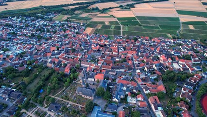 Aerial view around the old town of the town Ober-Olm on an early morning in Germany.
