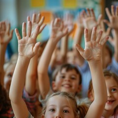 Obraz premium Children hands raised in a classroom with many friends
