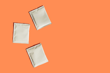 Packaging drip bag, three simple coffee isolated on colorful background. Mock up, empty plastic pack. place template for text, logo