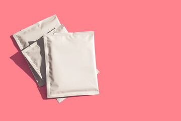 Packaging drip bag, three simple coffee isolated on colorful background. Mock up, empty plastic pack. place template for text, logo