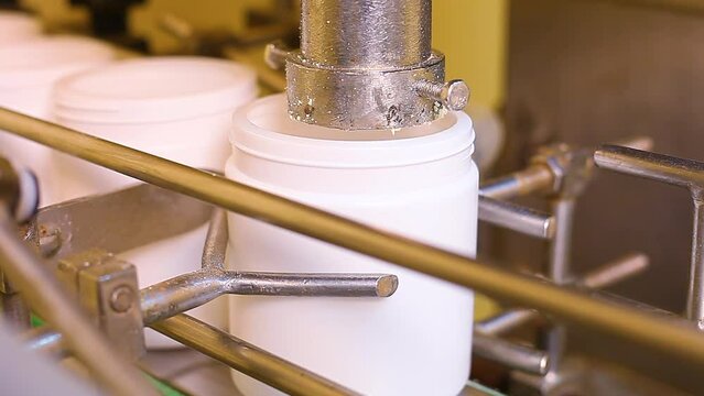 protein powder filling process. Creatine powder making and packing in plastic container boxes. pharma grade production factory. gmp iso certified manufacturing. powder filling process. making process.