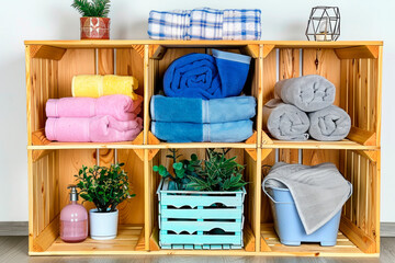 A shelf organizer for the bathroom with toiletries. Neat location. Order