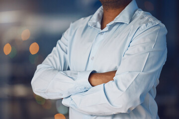 Office, crossed arms and closeup of business man for planning, confidence and company pride. Corporate person, professional and hands of worker ready for career, work and job opportunity in workplace