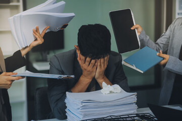 Stressful business man have so many paperwork in the office