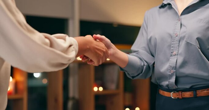 People, partnership and handshake for business, development and project management in corporate in deal. Welcome, agreement and onboarding for collaboration, contract or success with client at night
