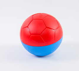 Fototapeta premium Red blue children's plastic ball on a white background.