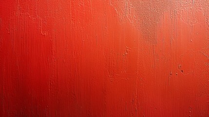   A tight shot of a red wall featuring two black objects, one centrally placed in each half
