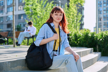 Portrait of young female college student outdoor