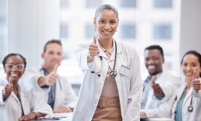 Portrait, team and doctor with thumbs up, woman and support for vaccine approval, healthcare funding and medical aid. Face, people or positive with hand gesture, professional with like, icon and sign