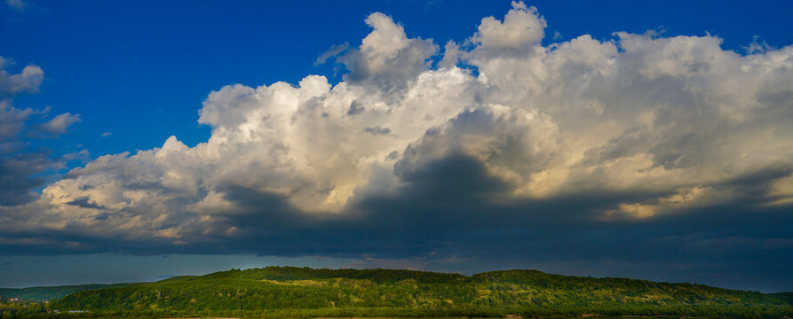 white storm clouds above unji hill.