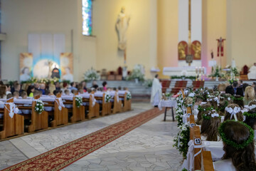 Ceremony of First Holy Communion in Catholic church
