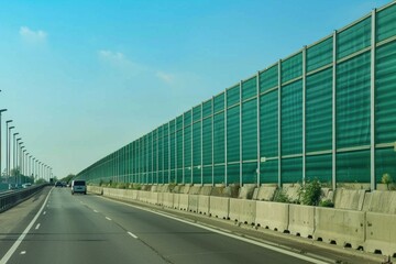 Obraz premium Protective Green Noise Barrier Wall for Highway and Traffic Sound Measurement