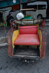 Indonesian pedicab or BECAK as traditional three wheels cab for local transportation
