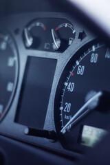 Closeup of cars speedometer displaying 0 mph