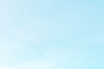 Blue pastel sky with white fluffy cloud. Cumulus clouds background. Cloudscape morning sky. The concepts of freedom of life, never give up and positive though energy.	