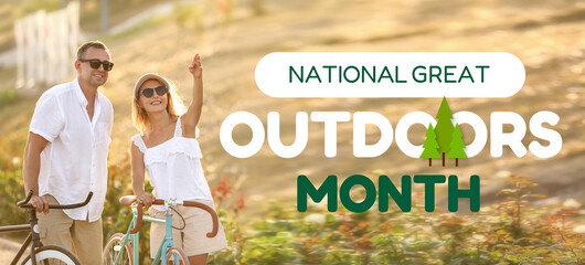 Mature couple with bicycles walking in city park on summer day